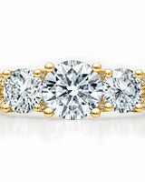 Luxury 18K yellow gold moissanite ring with open baskets and brilliant pavé detailing | SARATTI