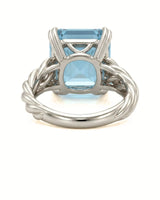 Luxury Asscher cut aquamarine ring in white gold with refined sculptural detail | SARATTI
