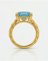 Luxury Asscher cut aquamarine ring in yellow gold with warm sculptural detail - SARATTI