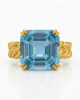 Luxury Asscher cut aquamarine ring in yellow gold with warm sculptural detail | SARATTI