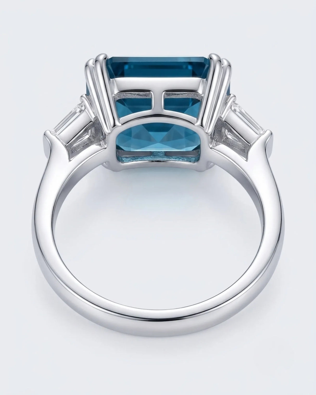 Luxury London Blue topaz statement ring with crisp diamond accents and substantial platinum setting | SARATTI