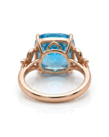 Luxury Swiss Blue topaz statement ring with sculpted diamond shoulders in 18K rose gold - SARATTI