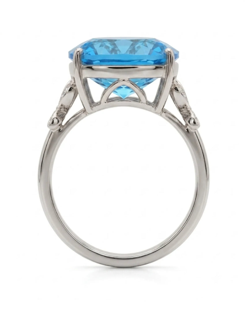 Luxury Swiss Blue topaz statement ring with sculpted diamond shoulders in 18K white gold - SARATTI
