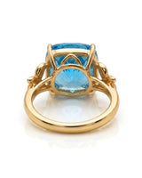 Luxury Swiss Blue topaz statement ring with sculpted diamond shoulders in 18K yellow gold - SARATTI