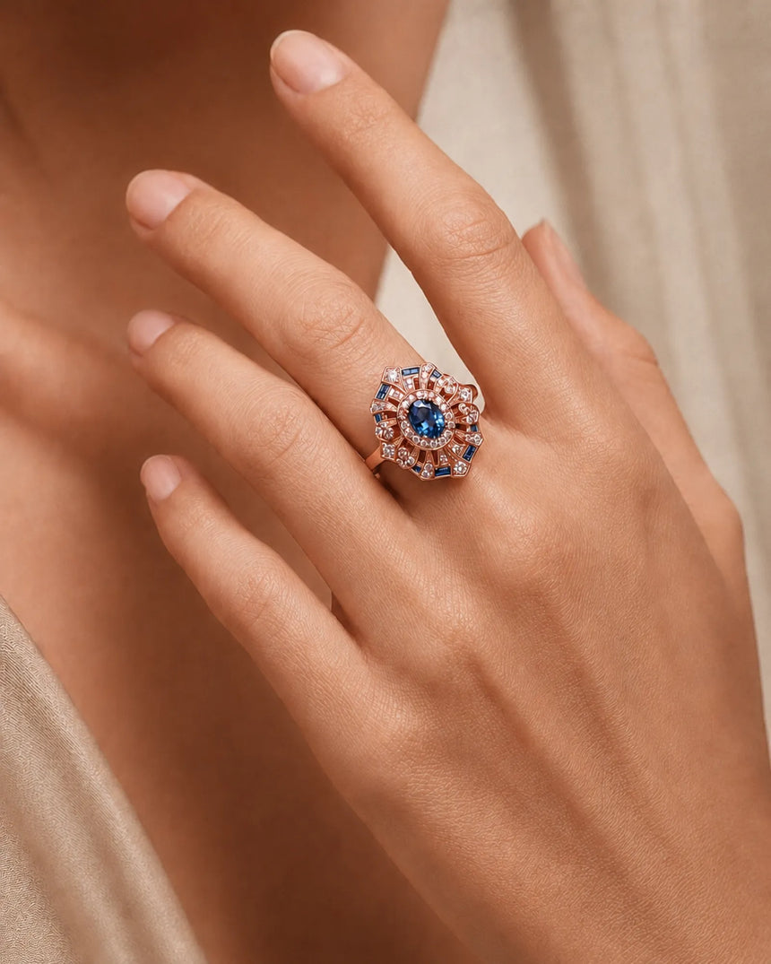 Luxury architectural topaz cocktail ring with blue accents and diamonds in 18K rose gold | SARATTI