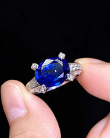 Luxury blue sapphire diamond ring in platinum with elevated open gallery setting - SARATTI