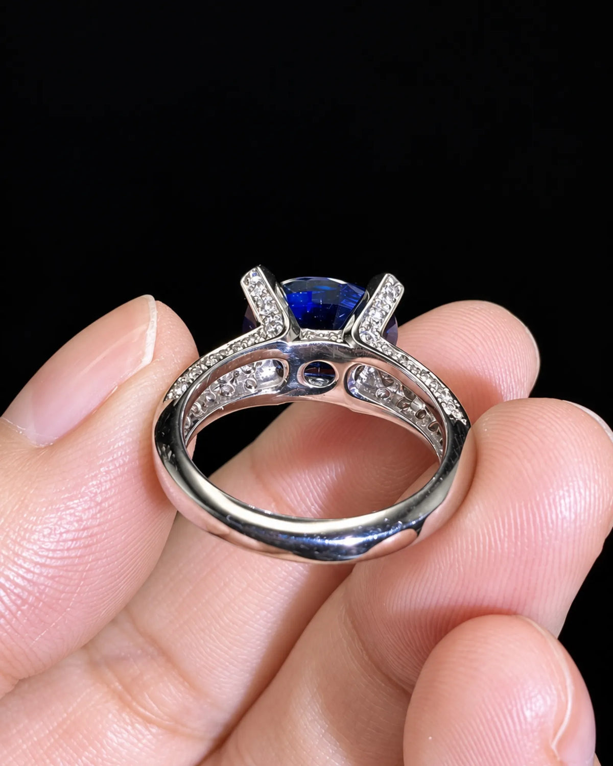 Luxury blue sapphire diamond ring in platinum with elevated open gallery setting | SARATTI