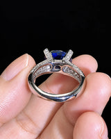 Luxury blue sapphire diamond ring in platinum with elevated open gallery setting | SARATTI