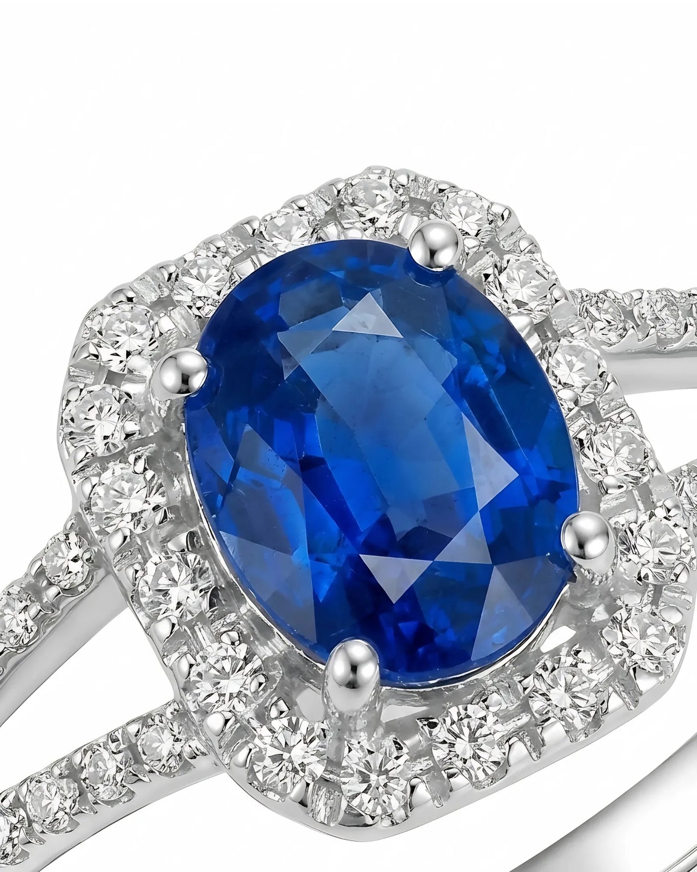 Luxury blue sapphire diamond ring with refined split shank design in platinum | SARATTI
