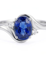 Luxury blue sapphire diamond ring with romantic curved design in 18K white gold |-SARATTI