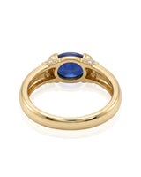 Luxury blue sapphire diamond ring with warm modern gold design in 18K yellow gold | SARATTI