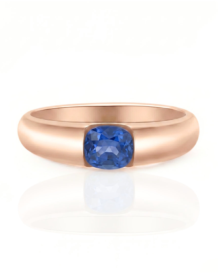 Luxury blue sapphire tension ring with minimalist 18K rose gold sculptural band | SARATTI