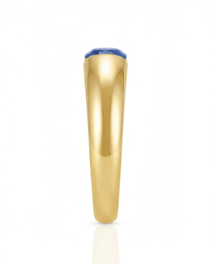 Luxury blue sapphire tension ring with minimalist 18K yellow gold sculptural band | SARATTI