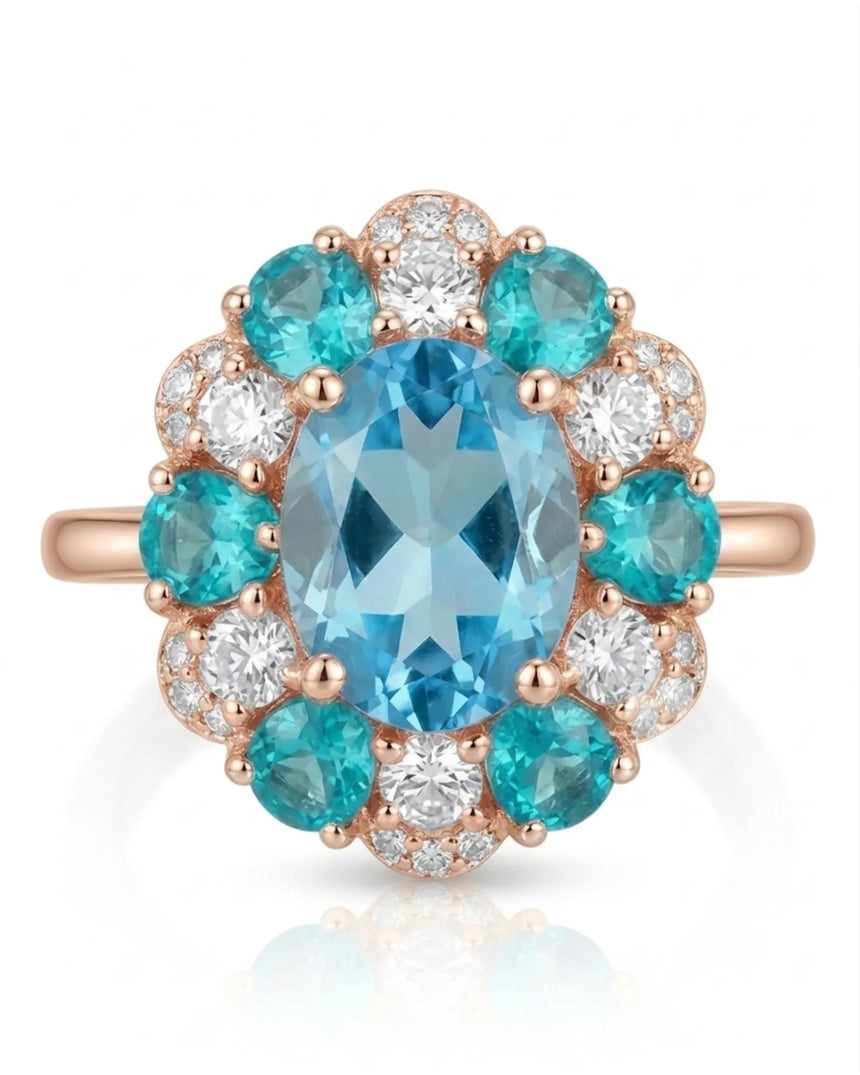Luxury blue topaz cocktail ring with apatite and diamond bloom in 18K rose gold | SARATTI