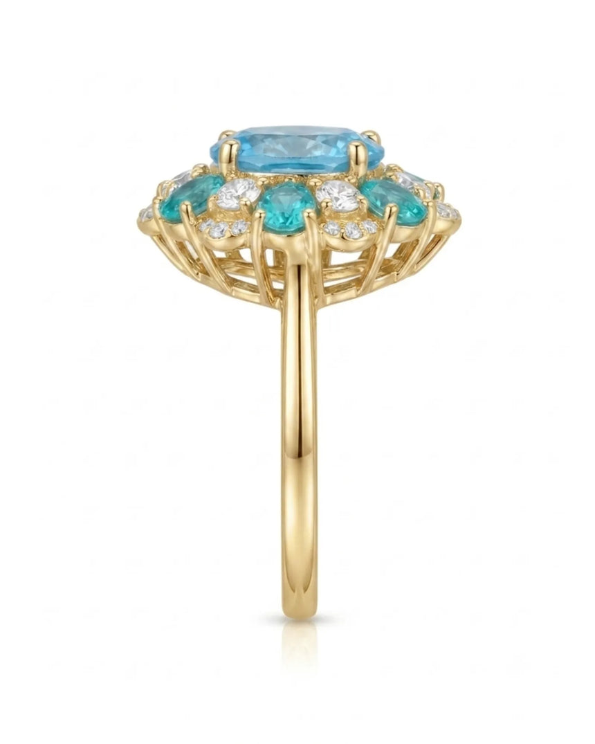 Luxury blue topaz cocktail ring with apatite and diamond bloom in 18K yellow gold | SARATTI