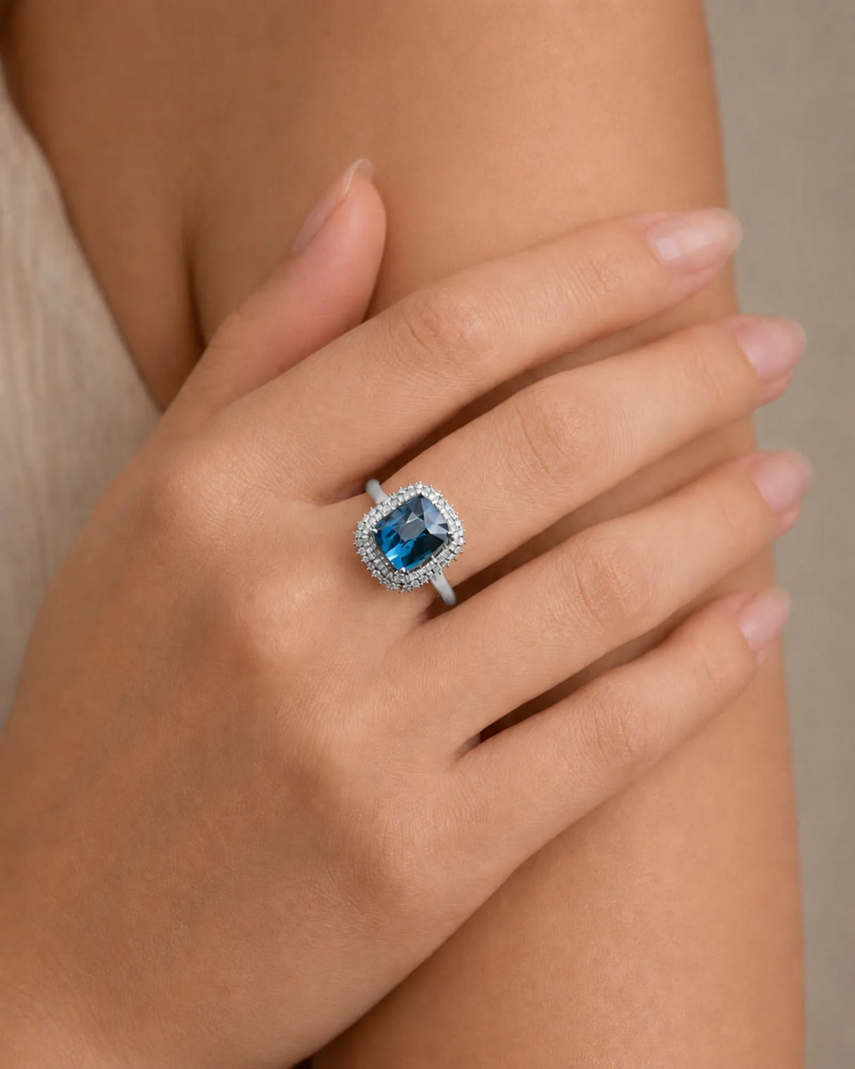 Luxury blue tourmaline and diamond ring in platinum with elegant halo structure | SARATTI