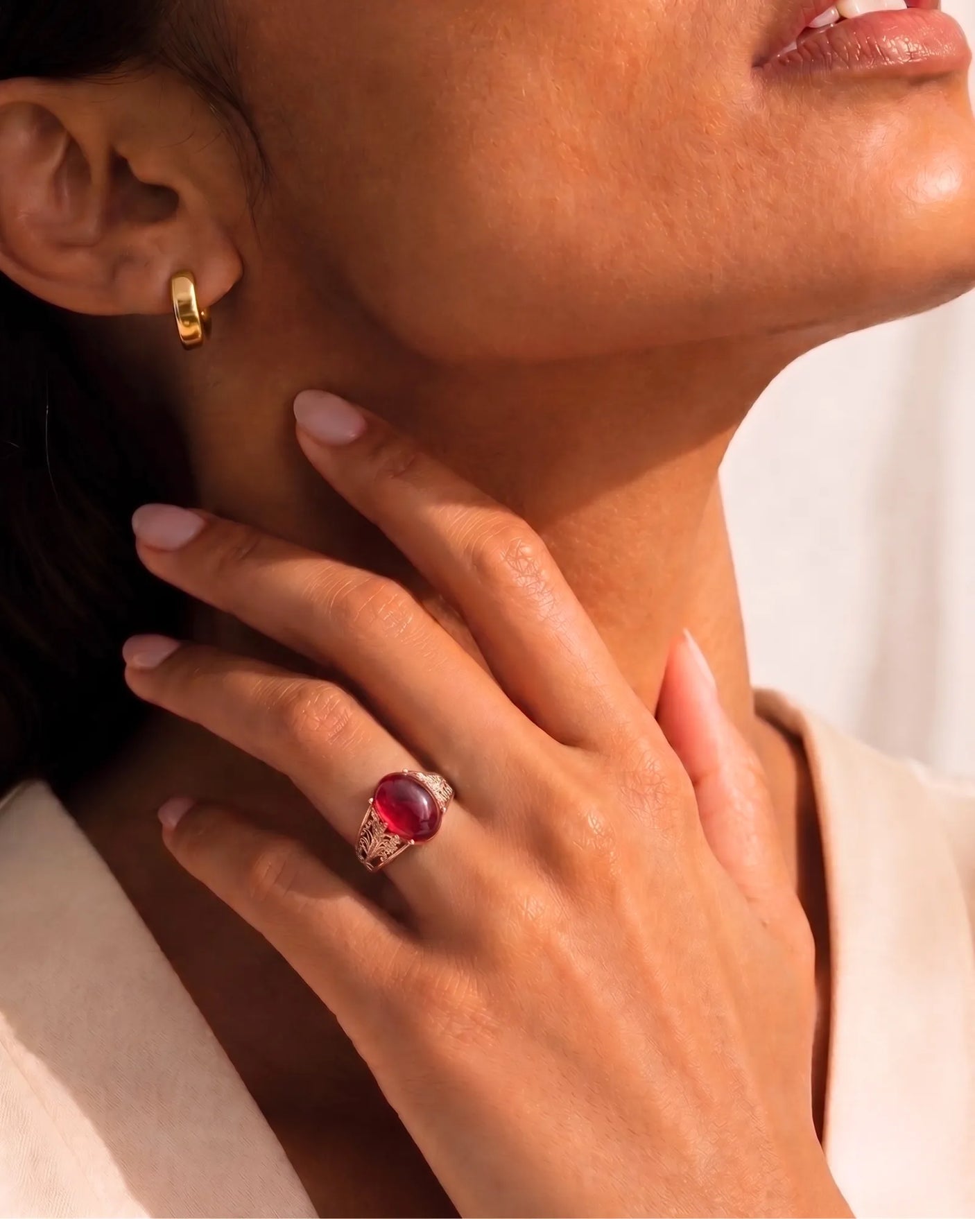 Luxury cabochon ruby ring with vintage diamond accents in polished rose gold | SARATTI