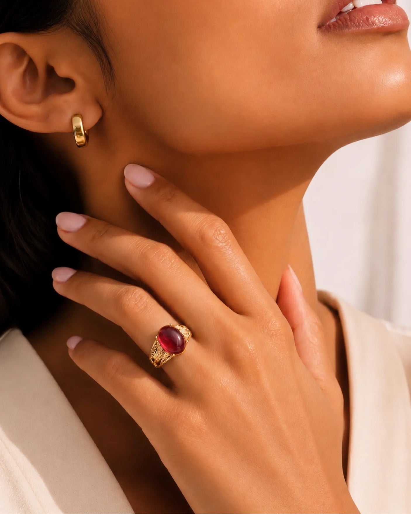 Luxury cabochon ruby ring with vintage diamond accents in polished yellow gold | SARATTI
