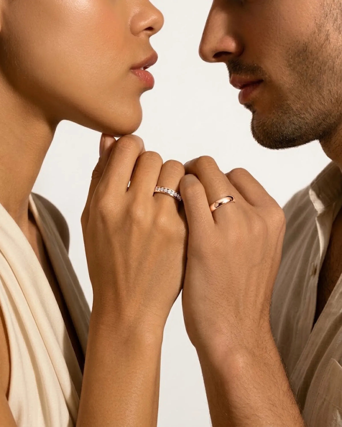Luxury channel set diamond wedding ring pair with polished 18K rose gold craftsmanship for couples | SARATTI