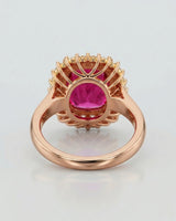 Luxury crimson tourmaline ring with natural diamond halo in 18K rose gold | SARATTI