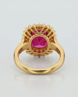 Luxury crimson tourmaline ring with natural diamond halo in 18K yellow gold | SARATTI