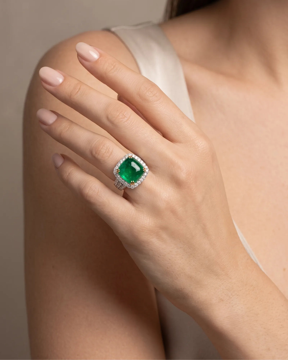 Luxury cushion emerald diamond halo ring with bold gemstone presence and detailed 18K gold craftsmanship | SARATTI