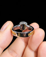 Luxury cushion emerald ring with diamond borders and distinctive woven 18K two tone gold craftsmanship | SARATTI