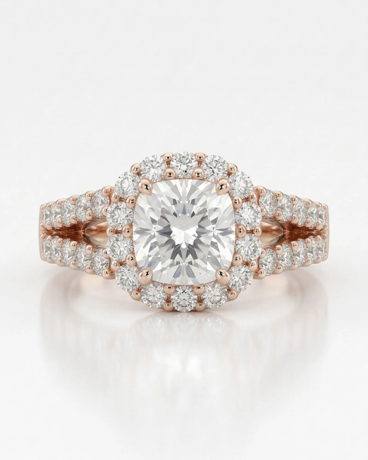 Luxury cushion halo moissanite ring set with sculptural rose gold split-shank detailing | SARATTI