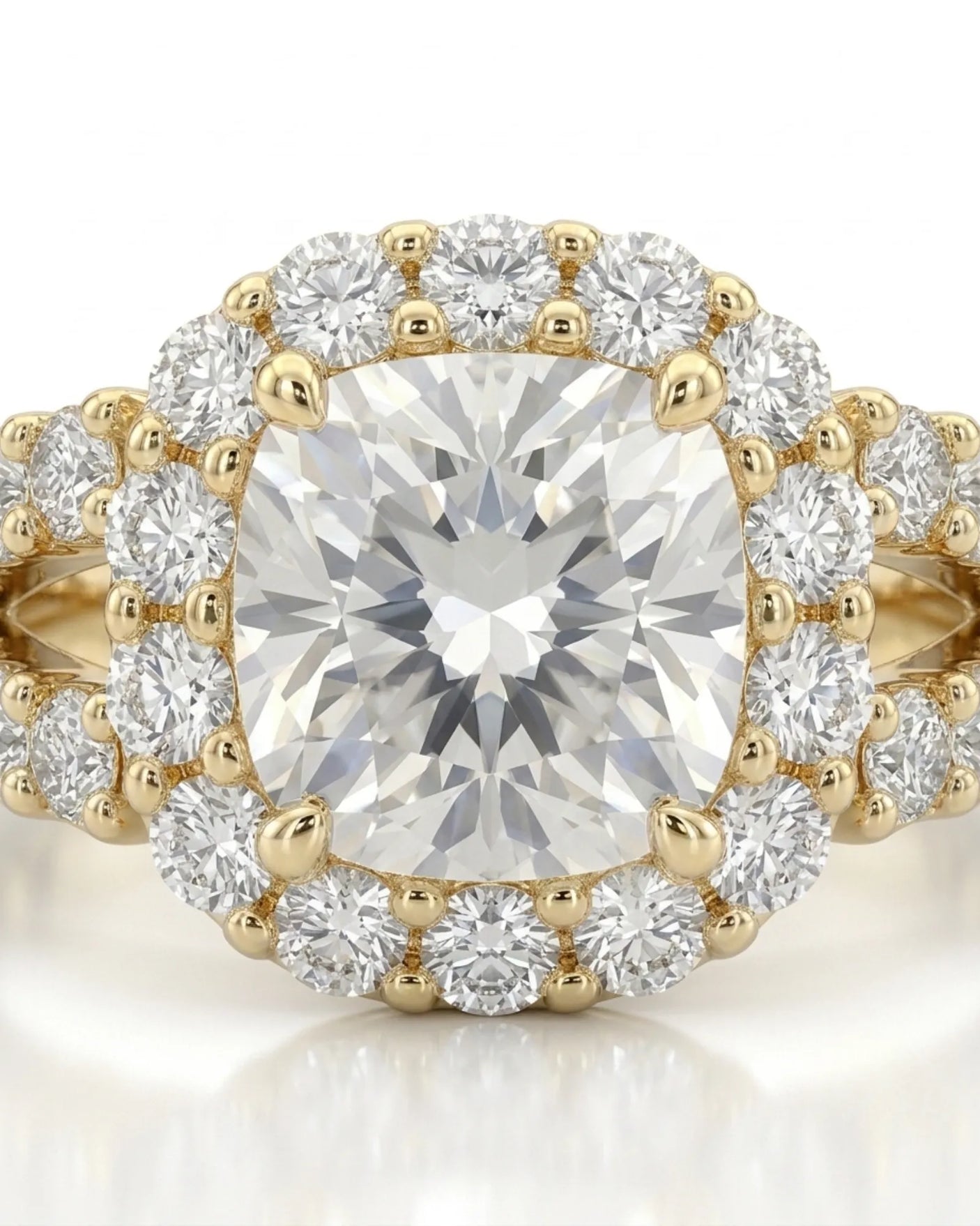 Luxury cushion halo moissanite ring set with sculptural yellow gold split-shank detailing | SARATTI