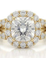 Luxury cushion halo moissanite ring set with sculptural yellow gold split-shank detailing | SARATTI