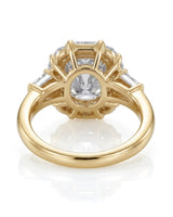 Luxury cushion moissanite ring with geometric halo and polished yellow gold setting - SARATTI