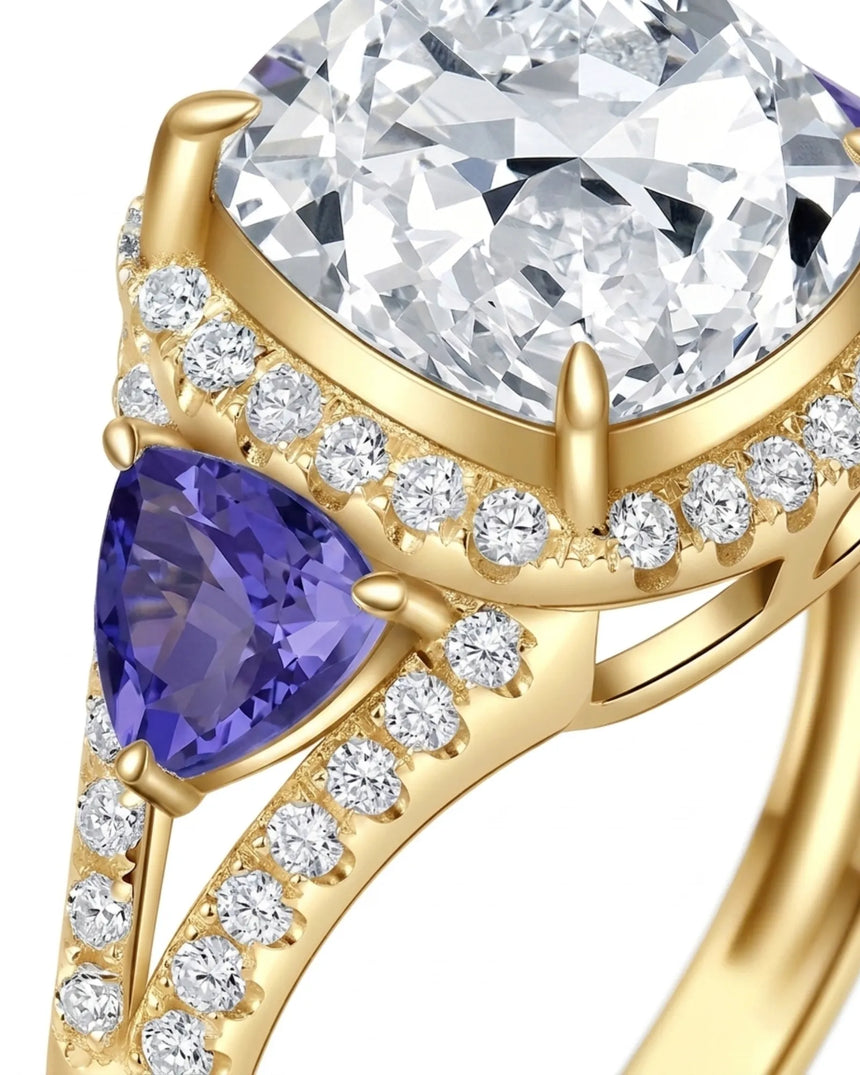 Luxury cushion moissanite ring with tanzanite side stones in yellow gold | SARATTI