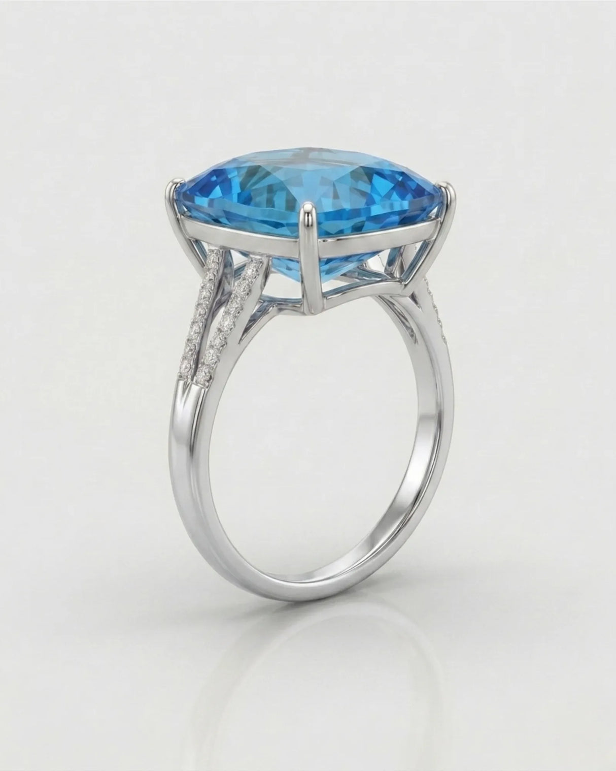 Luxury cushion topaz cocktail ring with architectural diamond shoulders in 18K white gold | SARATTI