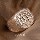 Luxury diamond halo signet ring in 18k rose gold engraved crest ring | SARATTI  