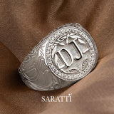 Luxury diamond halo signet ring in 18k white gold engraved crest ring | SARATTI  