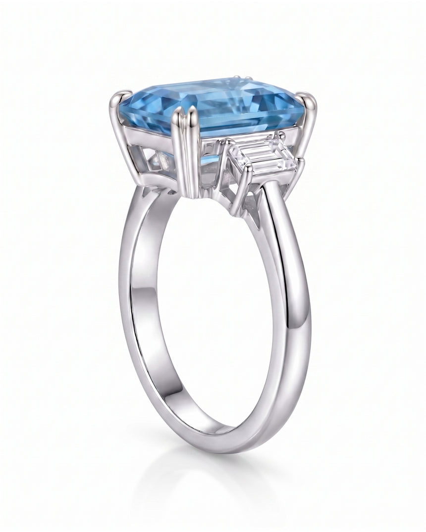 Luxury emerald cut aquamarine ring with refined platinum setting and diamonds | SARATTI