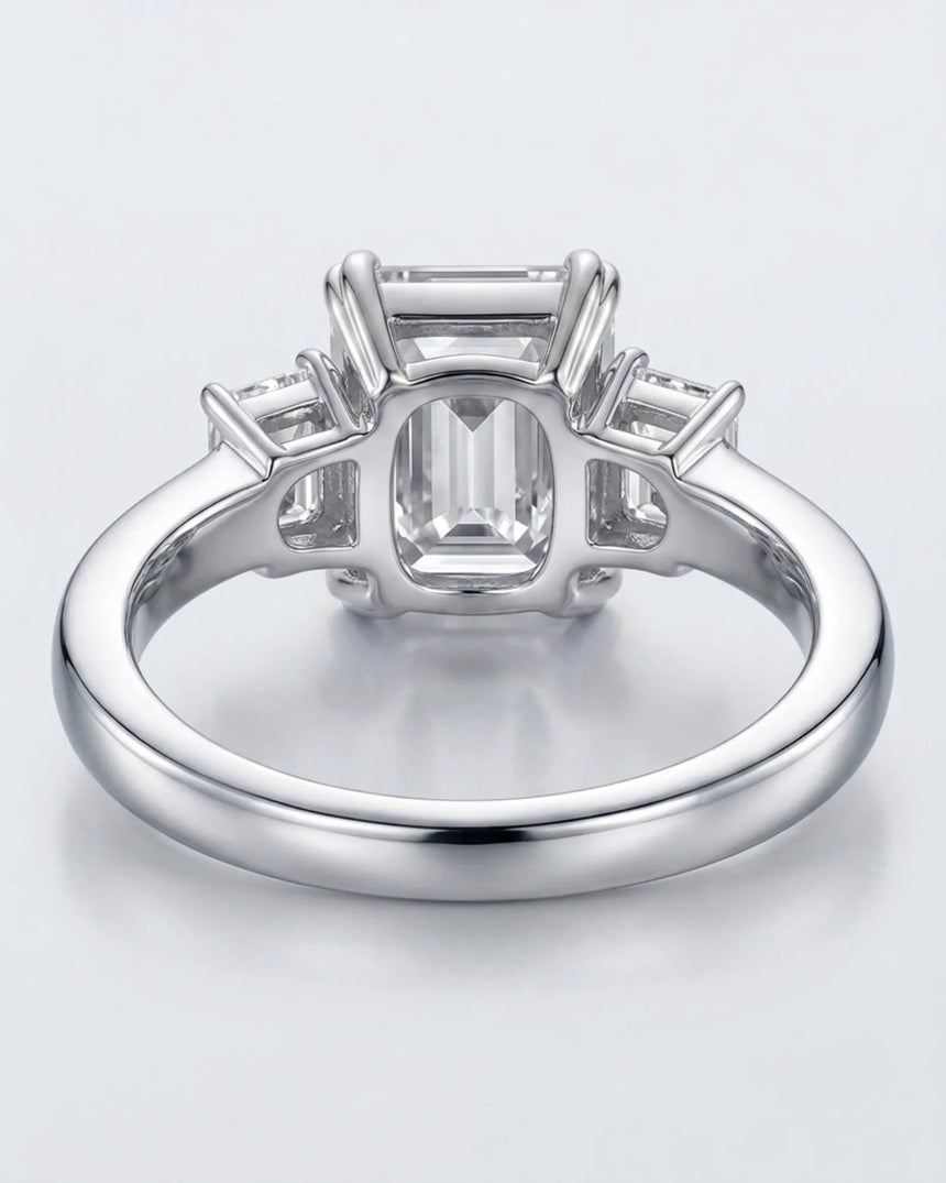 Luxury emerald cut moissanite ring with side stones and refined white gold setting - SARATTI