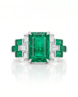 Luxury emerald cut natural emerald ring with baguette diamonds in Platinum | SARATTI