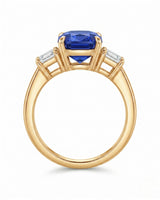 Luxury emerald cut sapphire ring with diamond accents in 18K yellow gold | SARATTI