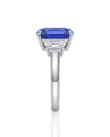 Luxury emerald cut sapphire ring with diamond accents in polished platinum | SARATTI