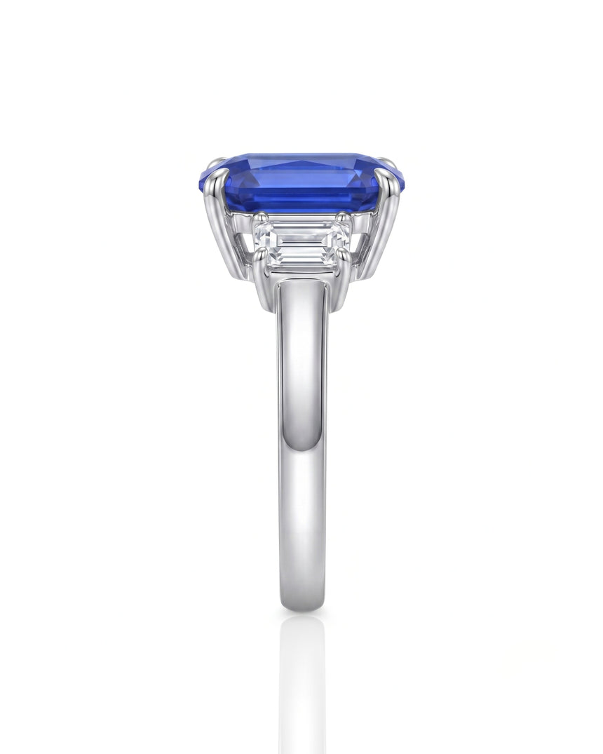Luxury emerald cut sapphire ring with diamond accents in polished platinum | SARATTI