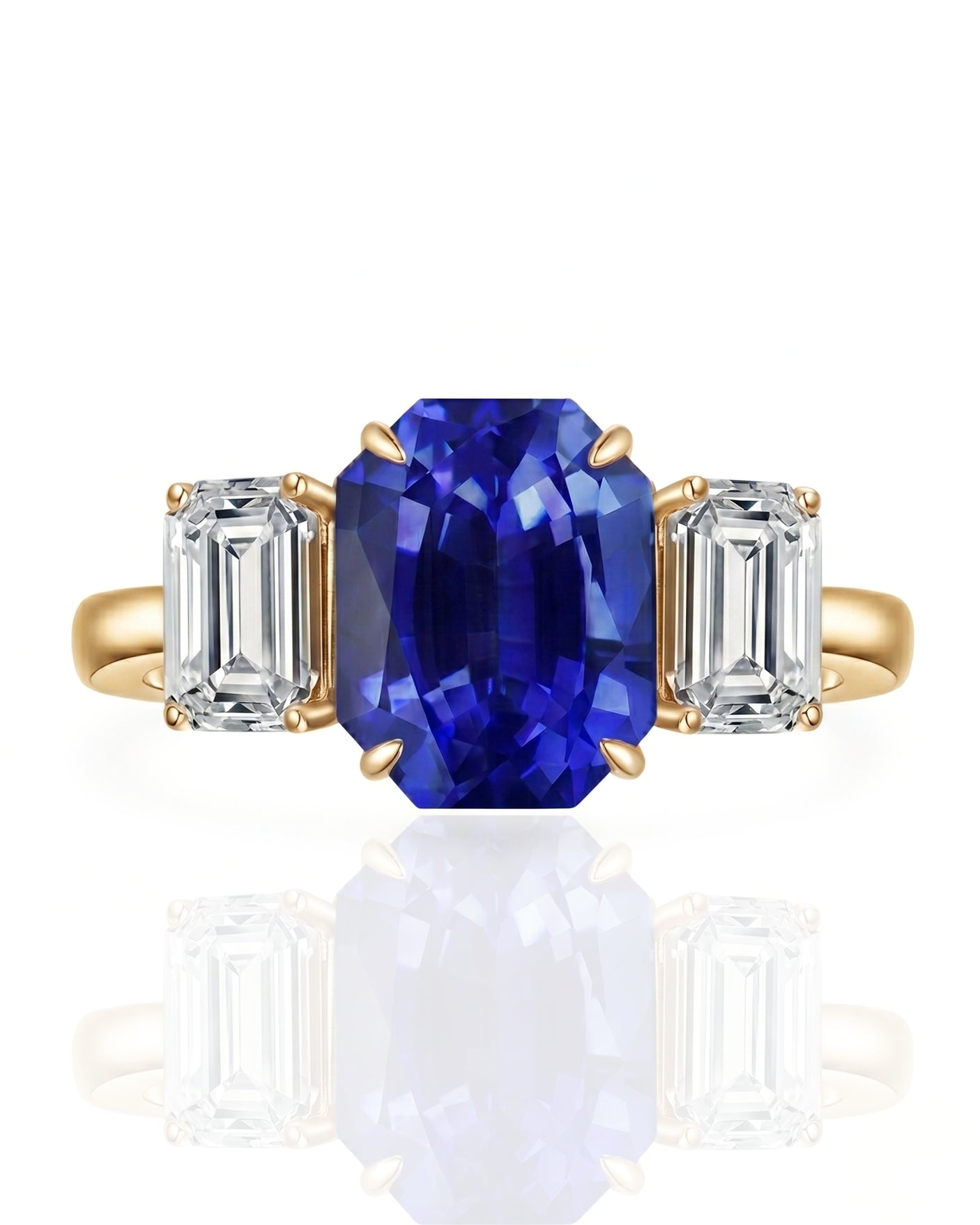 Luxury emerald cut sapphire statement ring with diamond accents in 18K yellow gold | SARATTI