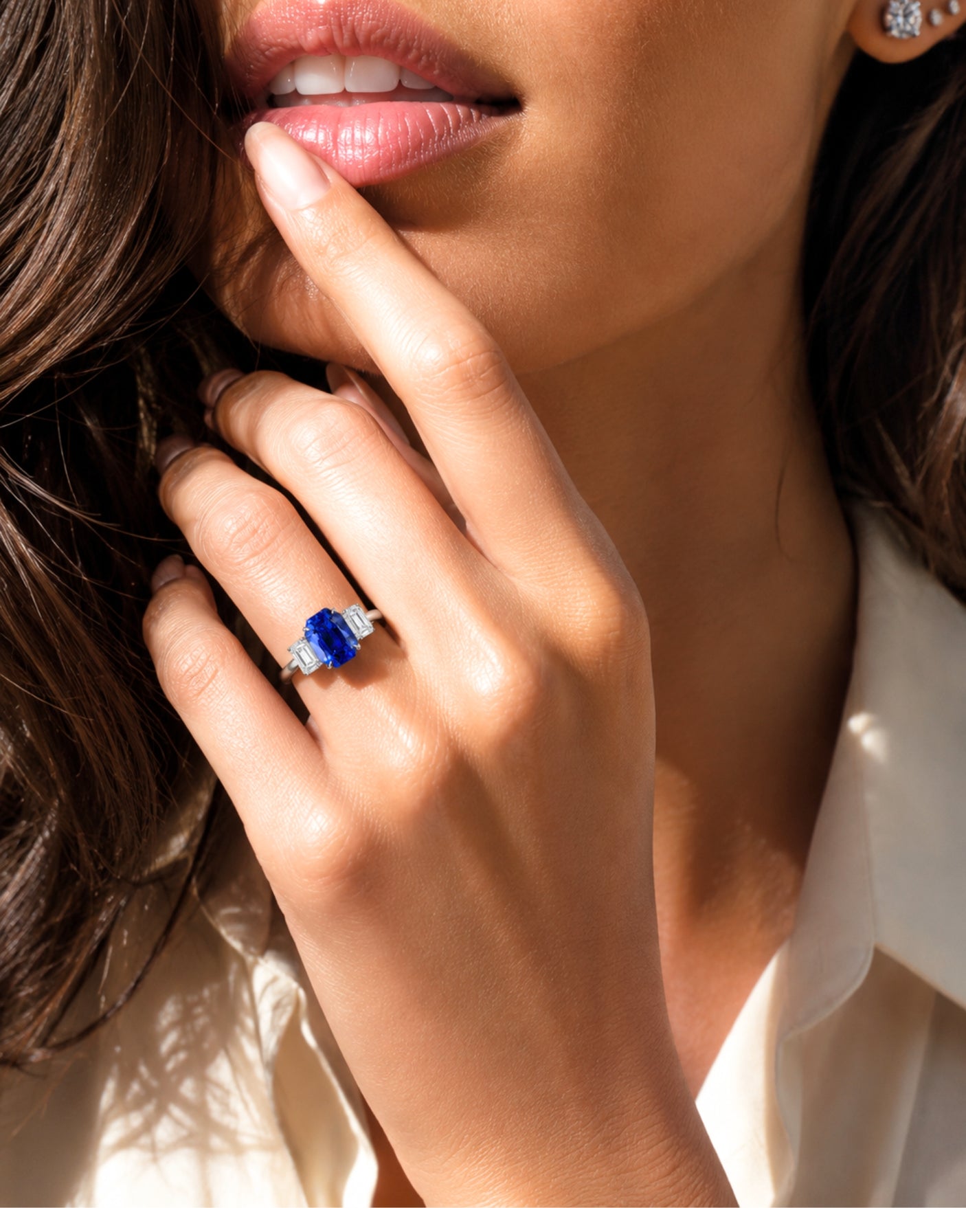 Luxury emerald cut sapphire statement ring with diamond accents in polished platinum - SARATTI