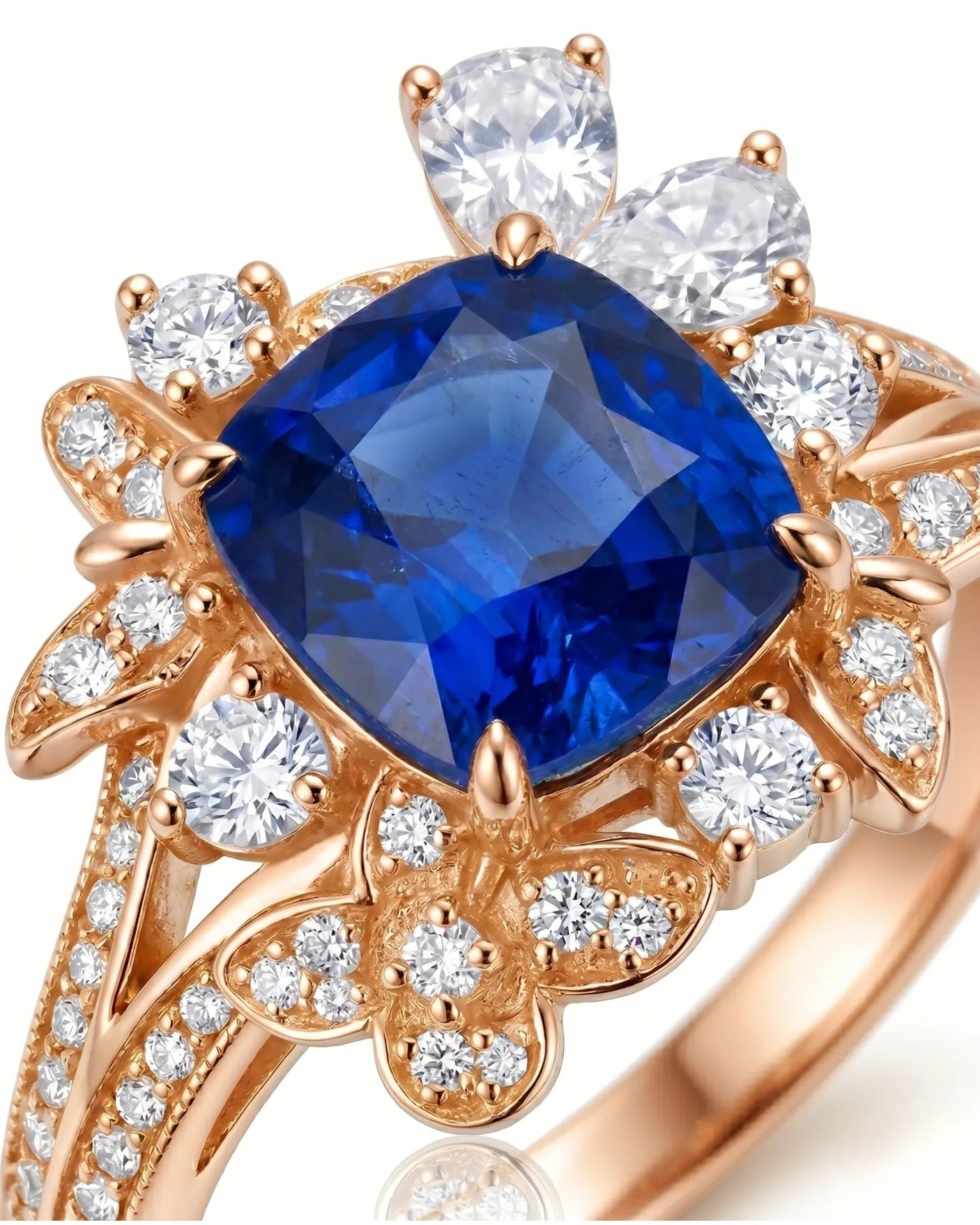 Luxury floral sapphire statement ring with mixed-cut diamonds in 18K rose gold | SARATTI