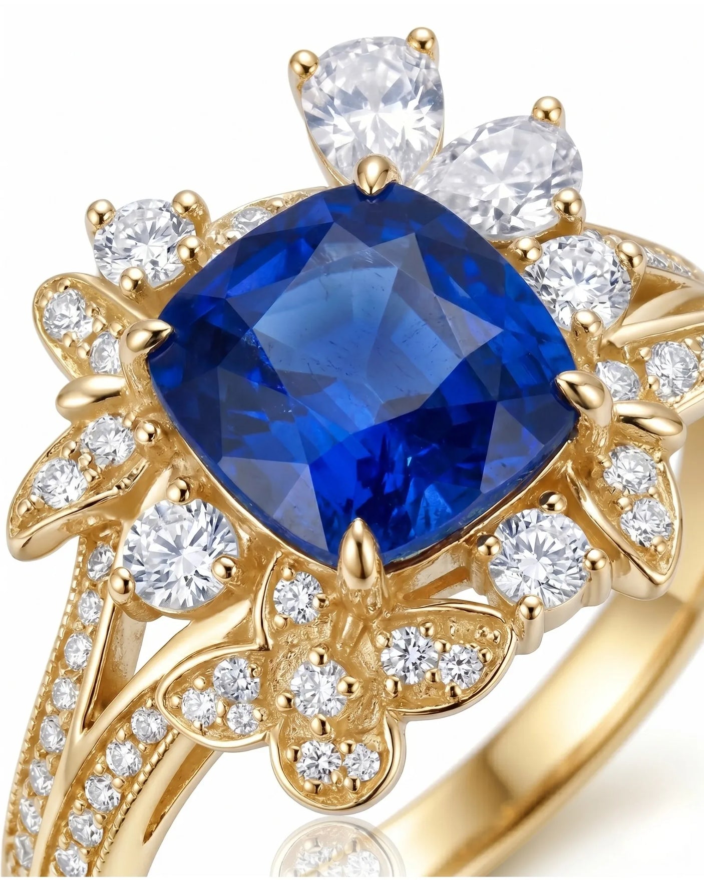 Luxury floral sapphire statement ring with mixed-cut diamonds in 18K yellow gold | SARATTI