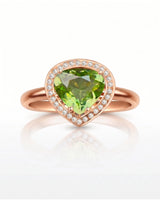 Luxury green tourmaline and diamond halo ring in elegant 18K Rose Gold | SARATTI