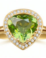 Luxury green tourmaline and diamond halo ring in elegant 18K Yellow Gold | SARATTI