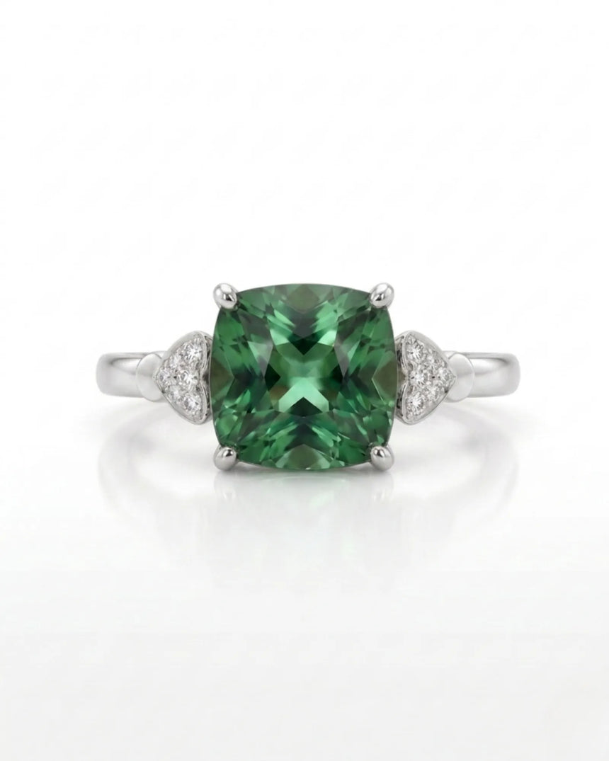 Luxury green tourmaline and diamond ring in platinum with romantic three-stone design | SARATTI