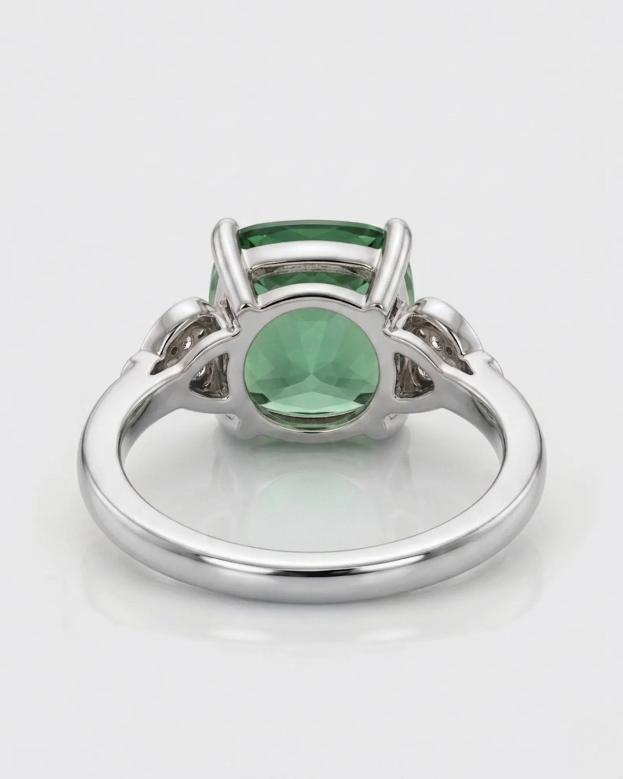 Luxury green tourmaline and diamond ring in white gold with romantic three-stone design | SARATTI