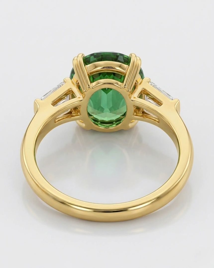 Luxury green tourmaline and diamond ring in yellow gold with refined three-stone design | SARATTI
